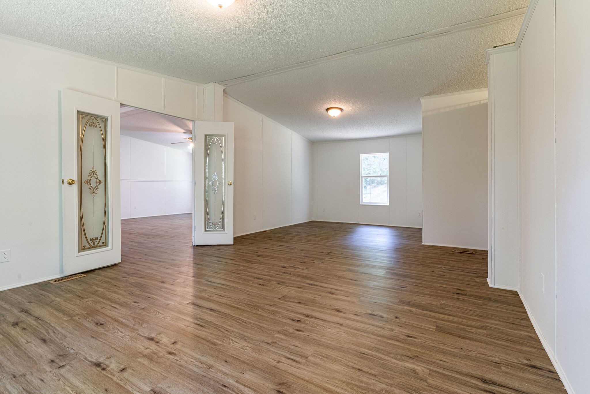 230 East Piney Road Dickson, TN 37055 - Photo 8 of 18 a view of empty room with wooden floor and window