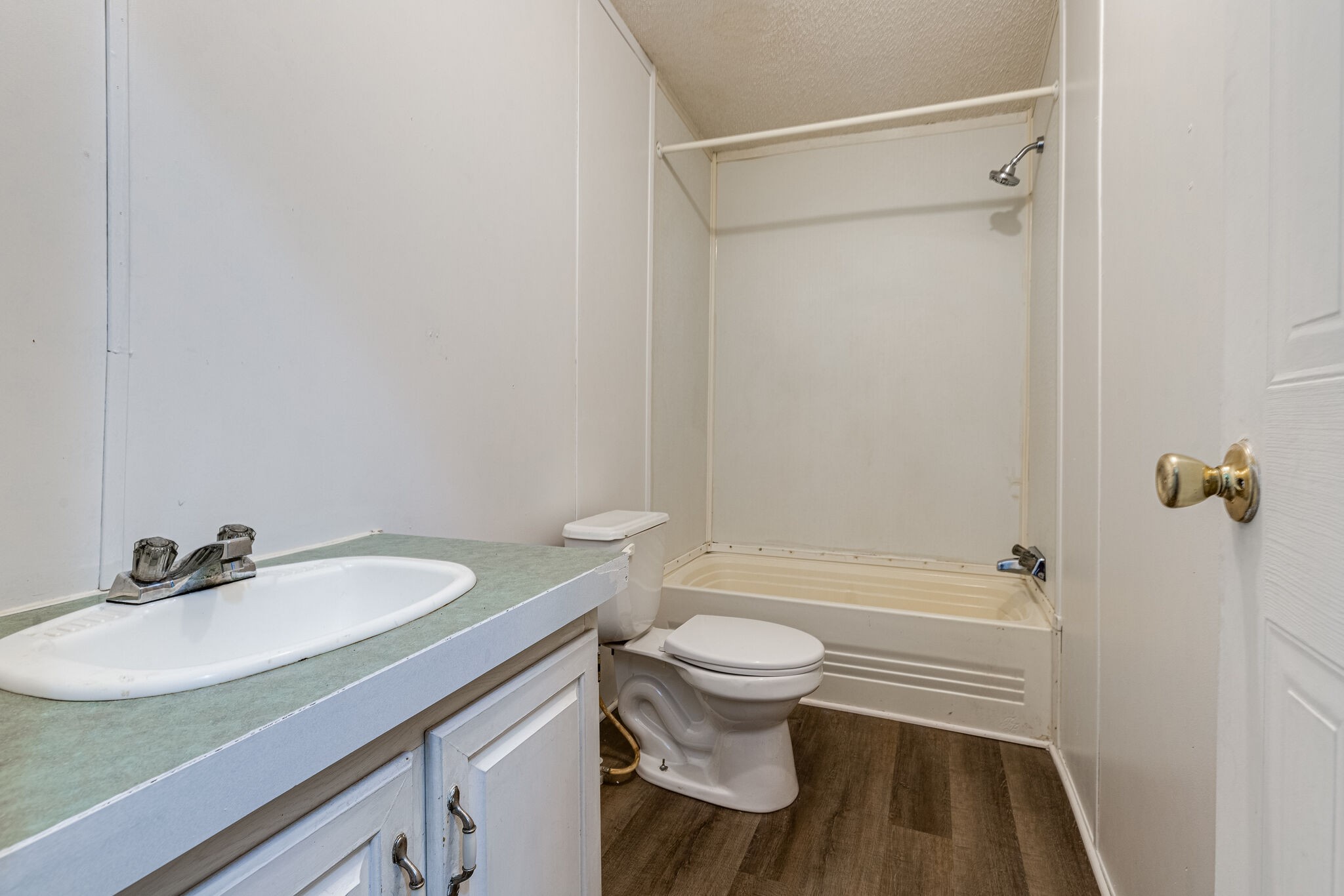 230 East Piney Road Dickson, TN 37055 - Photo 10 of 18 a bathroom with a sink toilet a shower and a mirror