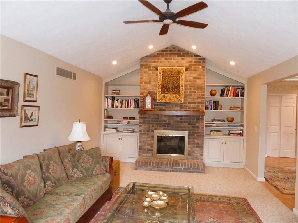 2 Shingle Mill Road Irondequoit, NY 14609 - Photo 5 of 36 Elegant living room with built-in shelves and gas