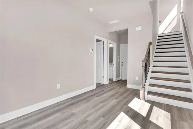 a view of wooden floor in an empty room
