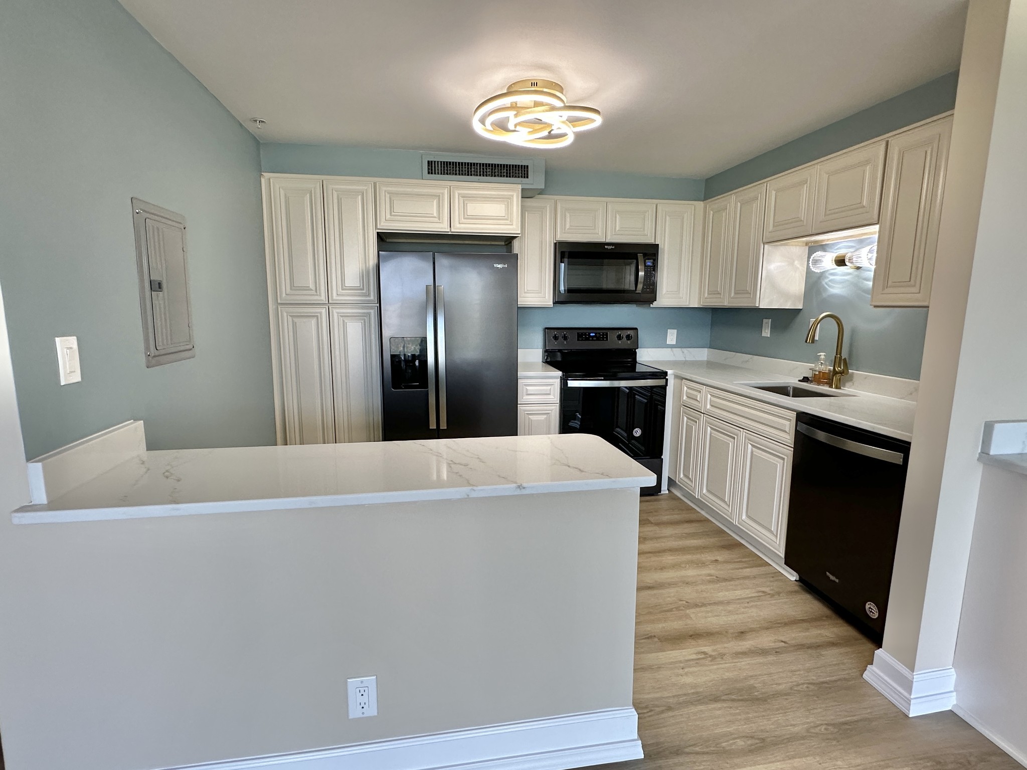 4215 Harding Pike, Unit 903 Nashville, TN 37205 - Photo 12 of 68 a kitchen with stainless steel appliances a refrigerator sink and cabinets