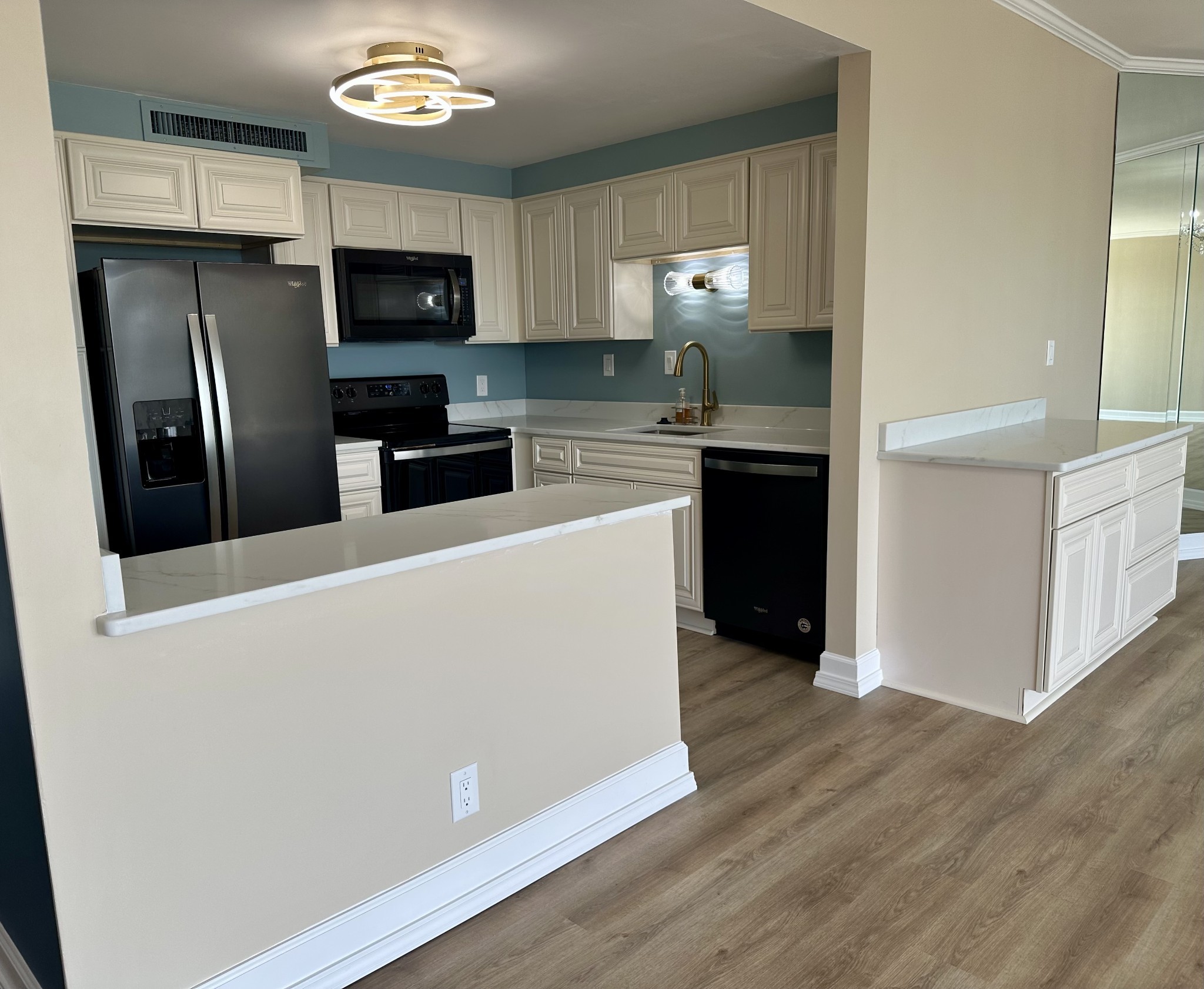 4215 Harding Pike, Unit 903 Nashville, TN 37205 - Photo 14 of 68 a kitchen with a refrigerator a stove top oven a sink and cabinets