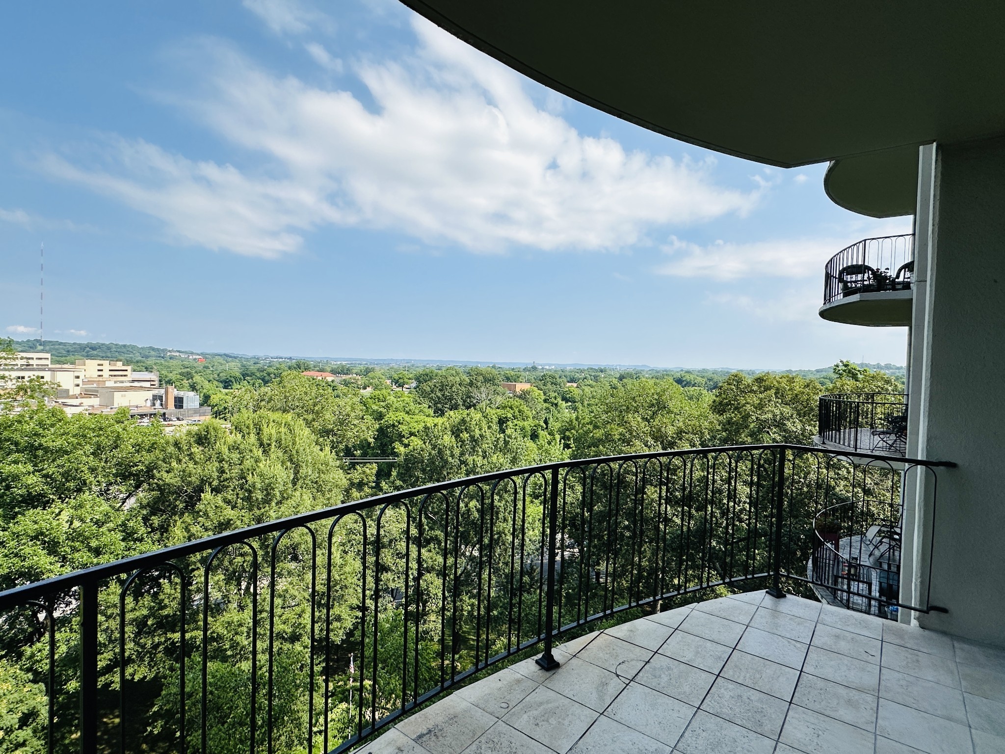 4215 Harding Pike, Unit 903 Nashville, TN 37205 - Photo 2 of 68 a view of a balcony with an outdoor space