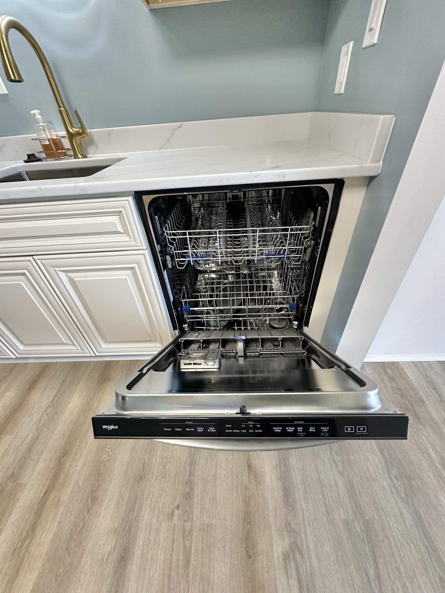 4215 Harding Pike, Unit 903 Nashville, TN 37205 - Photo 22 of 68 a view of kitchen with wooden floor and staircase