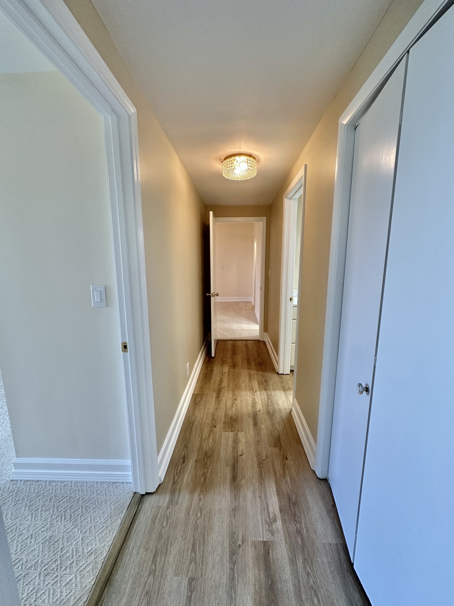 4215 Harding Pike, Unit 903 Nashville, TN 37205 - Photo 27 of 68 a view of hallway with wooden floor