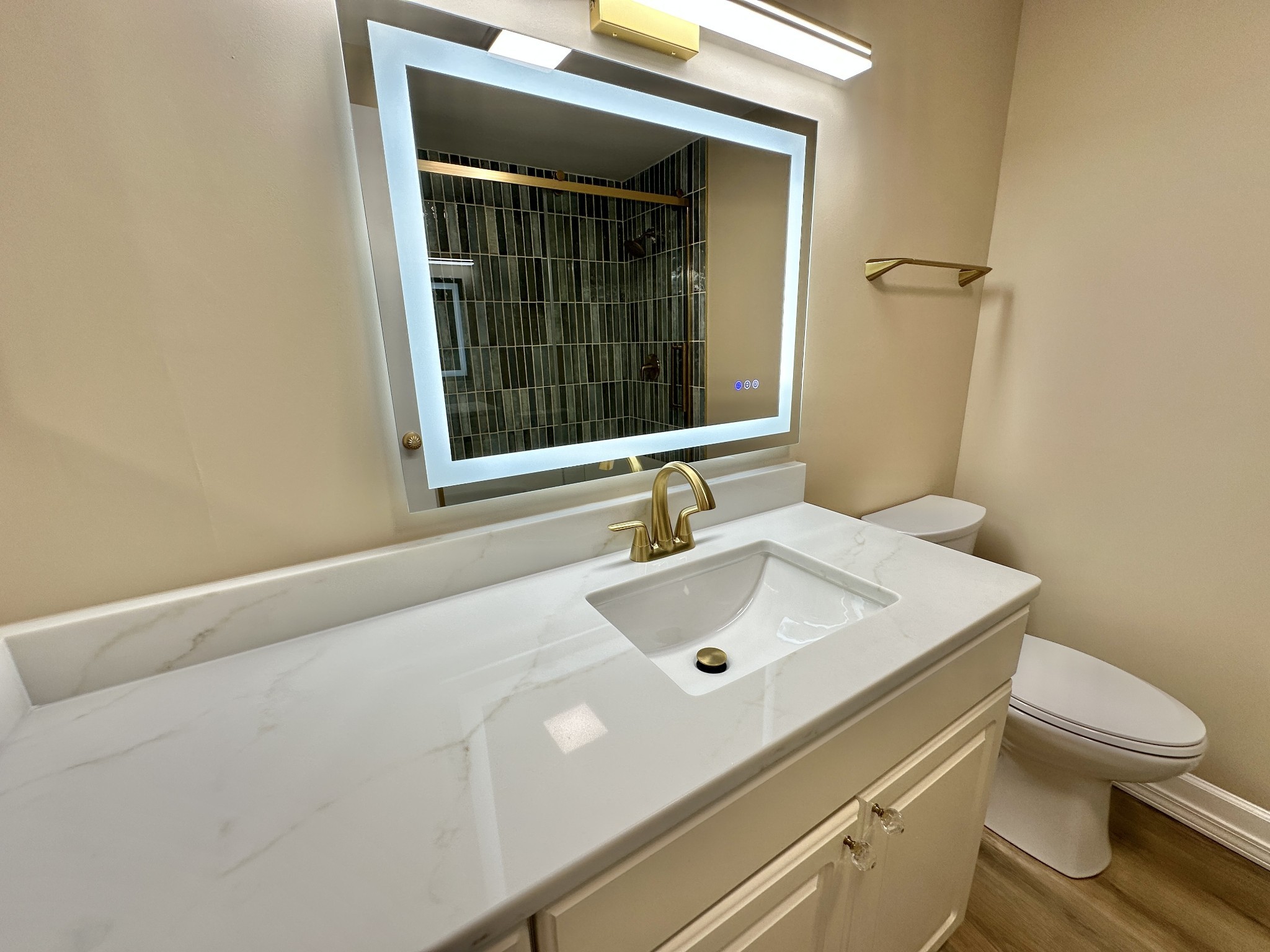 4215 Harding Pike, Unit 903 Nashville, TN 37205 - Photo 33 of 68 a bathroom with a sink a toilet and shower