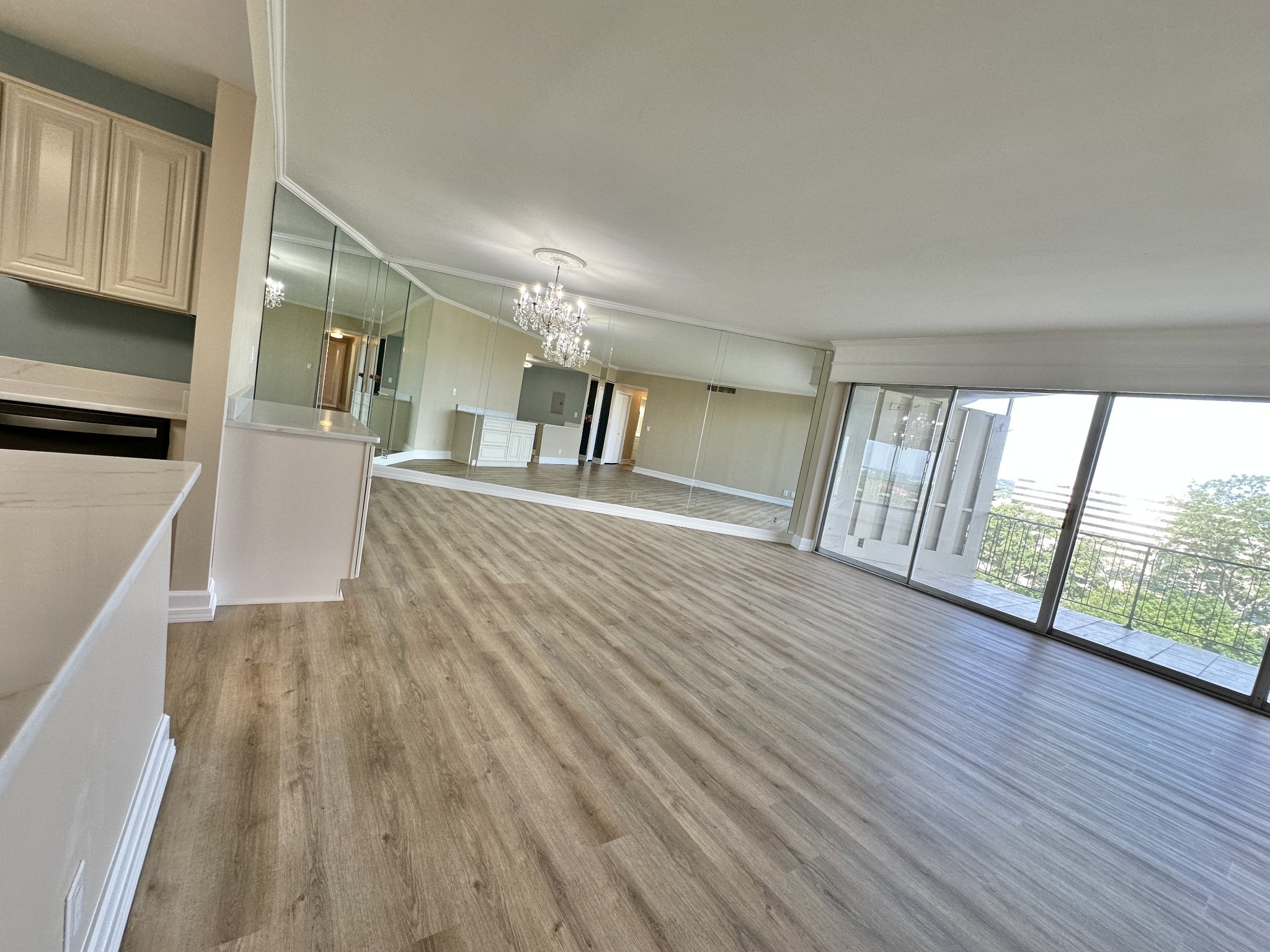 4215 Harding Pike, Unit 903 Nashville, TN 37205 - Photo 8 of 68 wooden floor in an empty room with a window