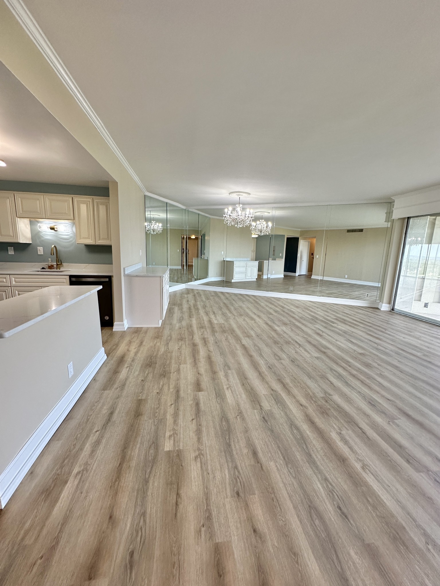 4215 Harding Pike, Unit 903 Nashville, TN 37205 - Photo 9 of 68 a large space with a lot of counter space and a wooden floor