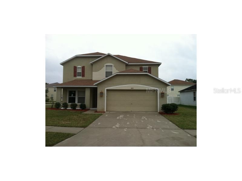 11106 Rising Mist Boulevard Riverview, FL 33578 - Photo 1 of 1 a front view of a house with a yard