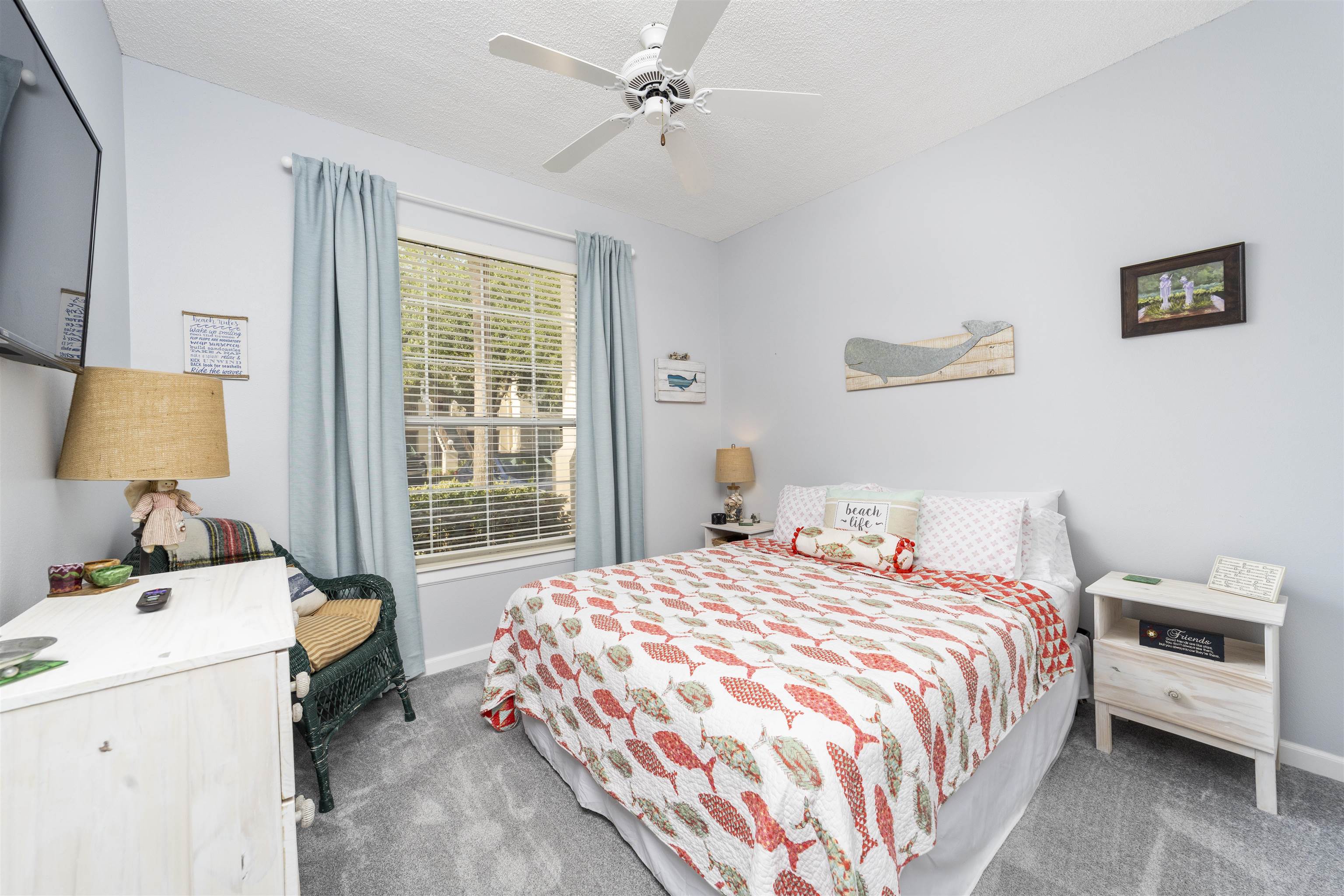 208 Augusta Circle St. Augustine, FL 32086 - Photo 32 of 34 a bedroom with a bed and a window