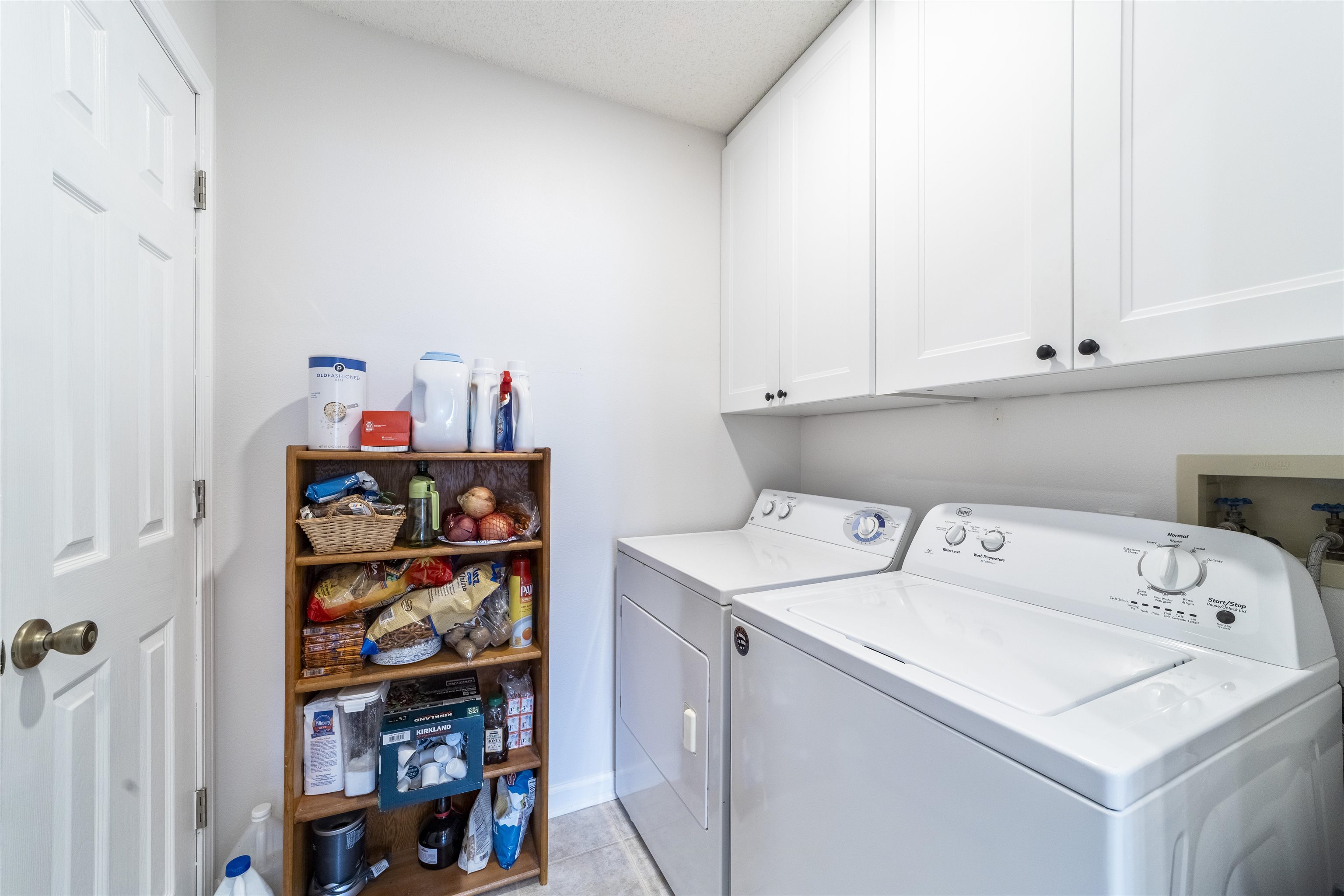 208 Augusta Circle St. Augustine, FL 32086 - Photo 10 of 34 a utility room with dryer and washer