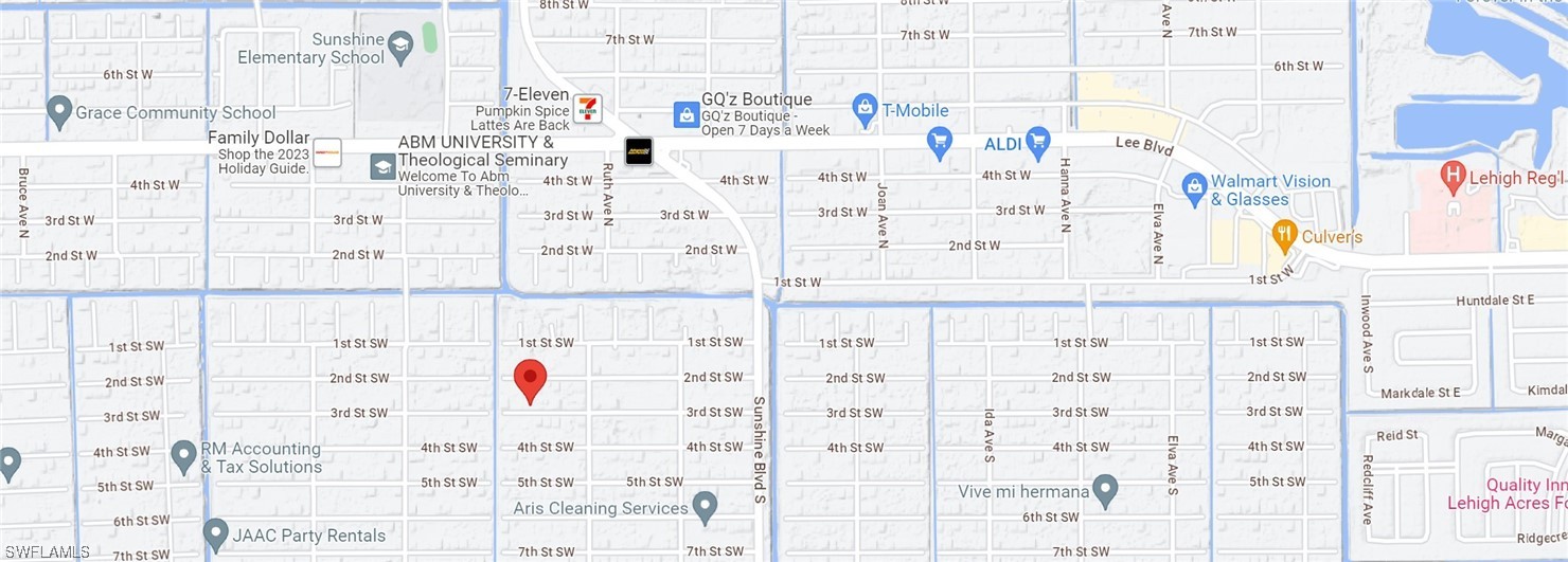 3312 3rd Street Southwest Lehigh Acres, FL 33976 - Photo 5 of 7 a bathroom with a sink and a shower curtain