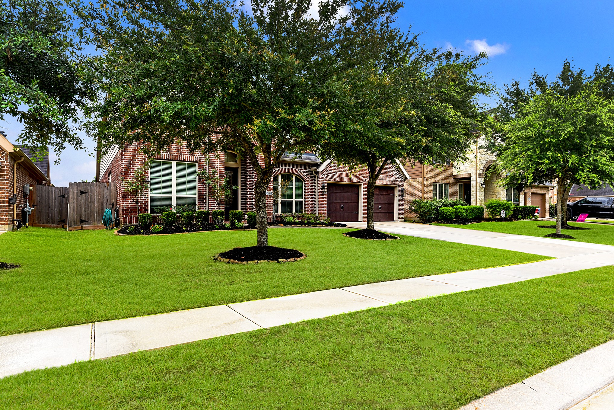 2939 Bobby Jones Road Katy, TX 77494 - Photo 3 of 50 a front view of a house with yard and green space