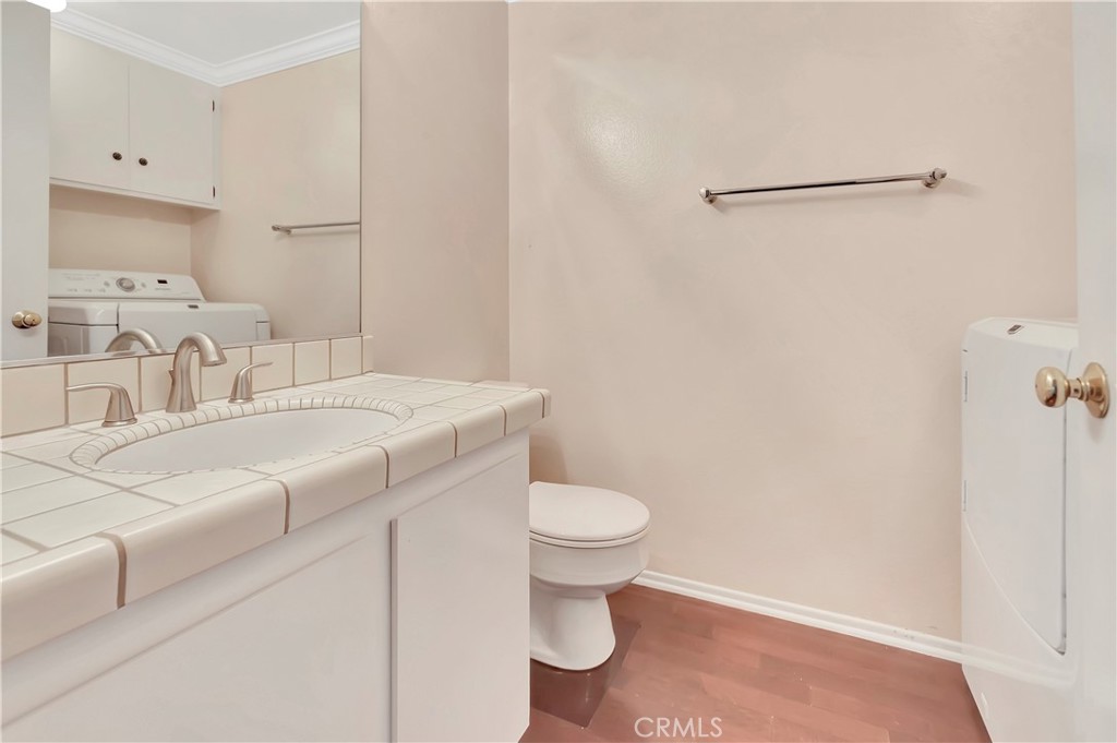 106 Sequoia Tree Lane Irvine, CA 92612 - Photo 11 of 12 a bathroom with a sink and a toilet