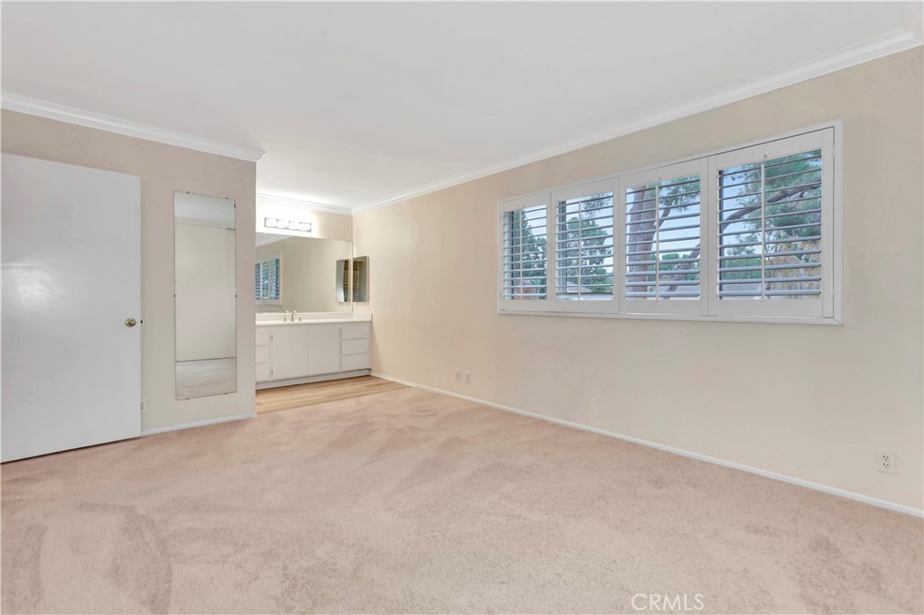 106 Sequoia Tree Lane Irvine, CA 92612 - Photo 6 of 12 a view of an empty room with a window