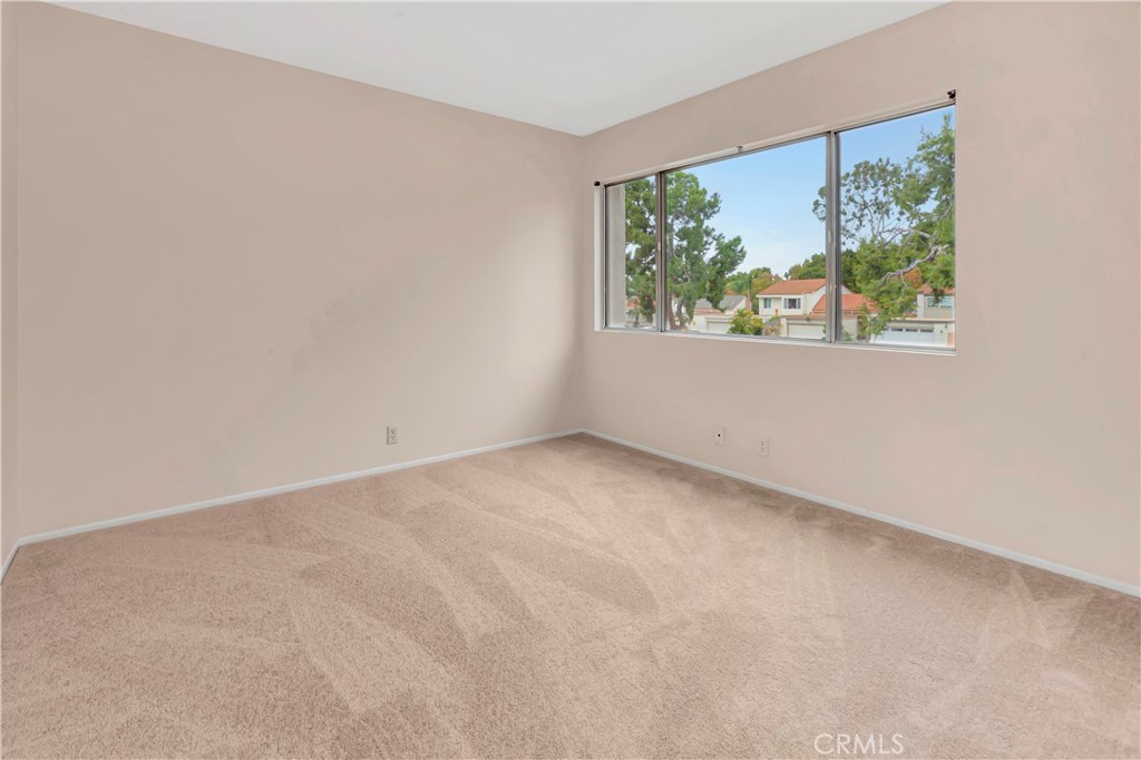 106 Sequoia Tree Lane Irvine, CA 92612 - Photo 8 of 12 an empty room with a window
