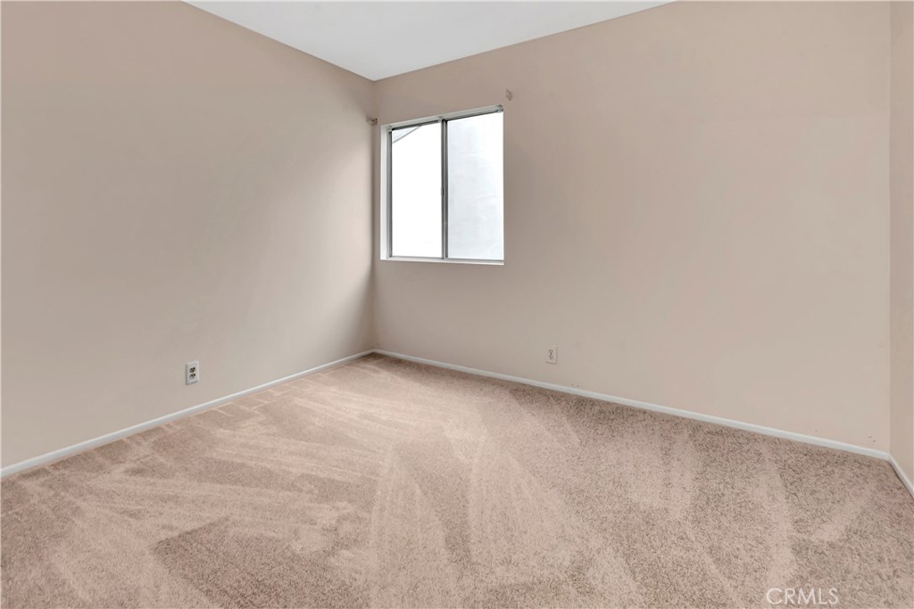 106 Sequoia Tree Lane Irvine, CA 92612 - Photo 10 of 12 an empty room with a window