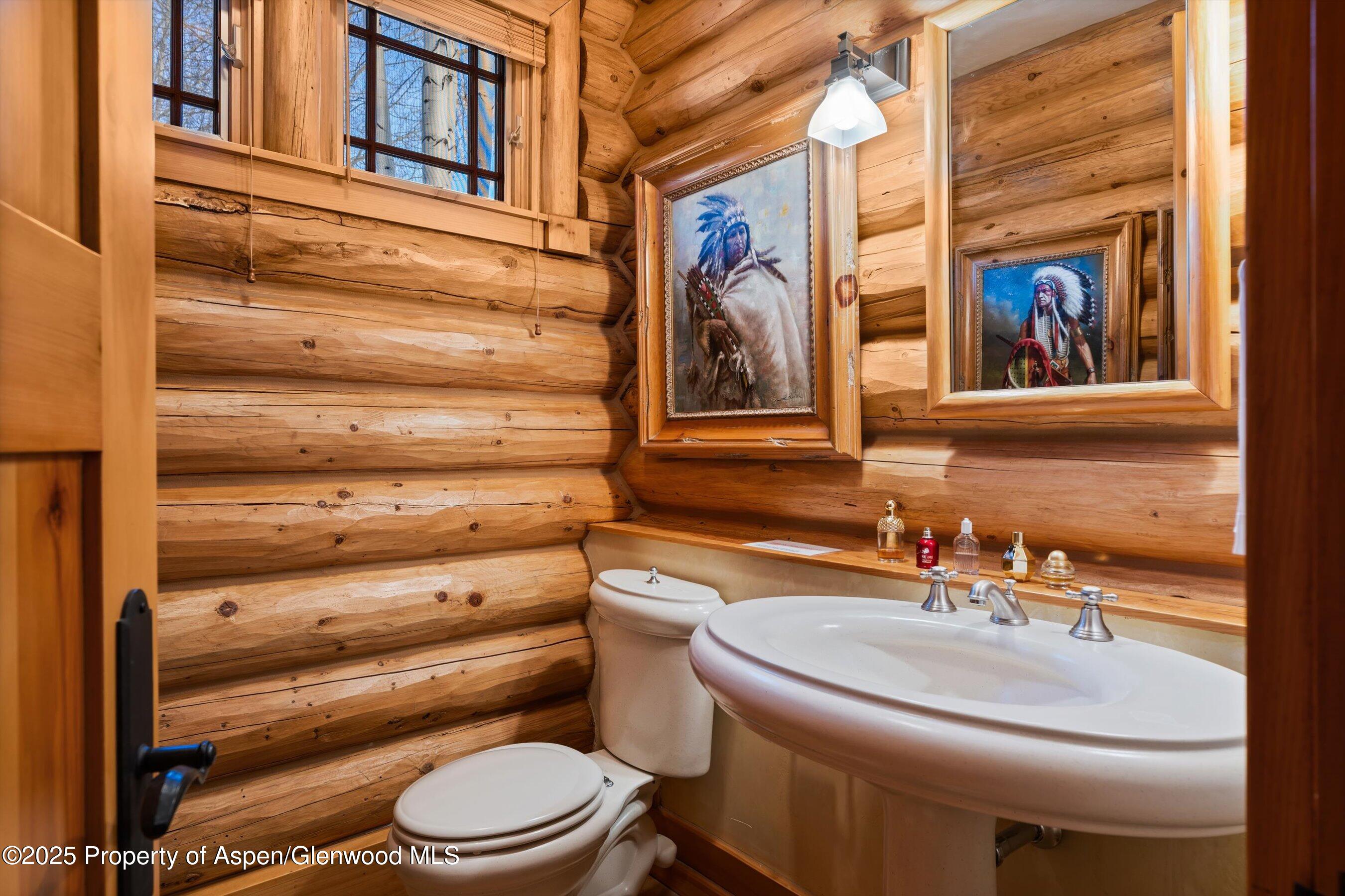 195 North Hayden Road Aspen, CO 81611 - Photo 13 of 39 a bathroom with a toilet and a sink