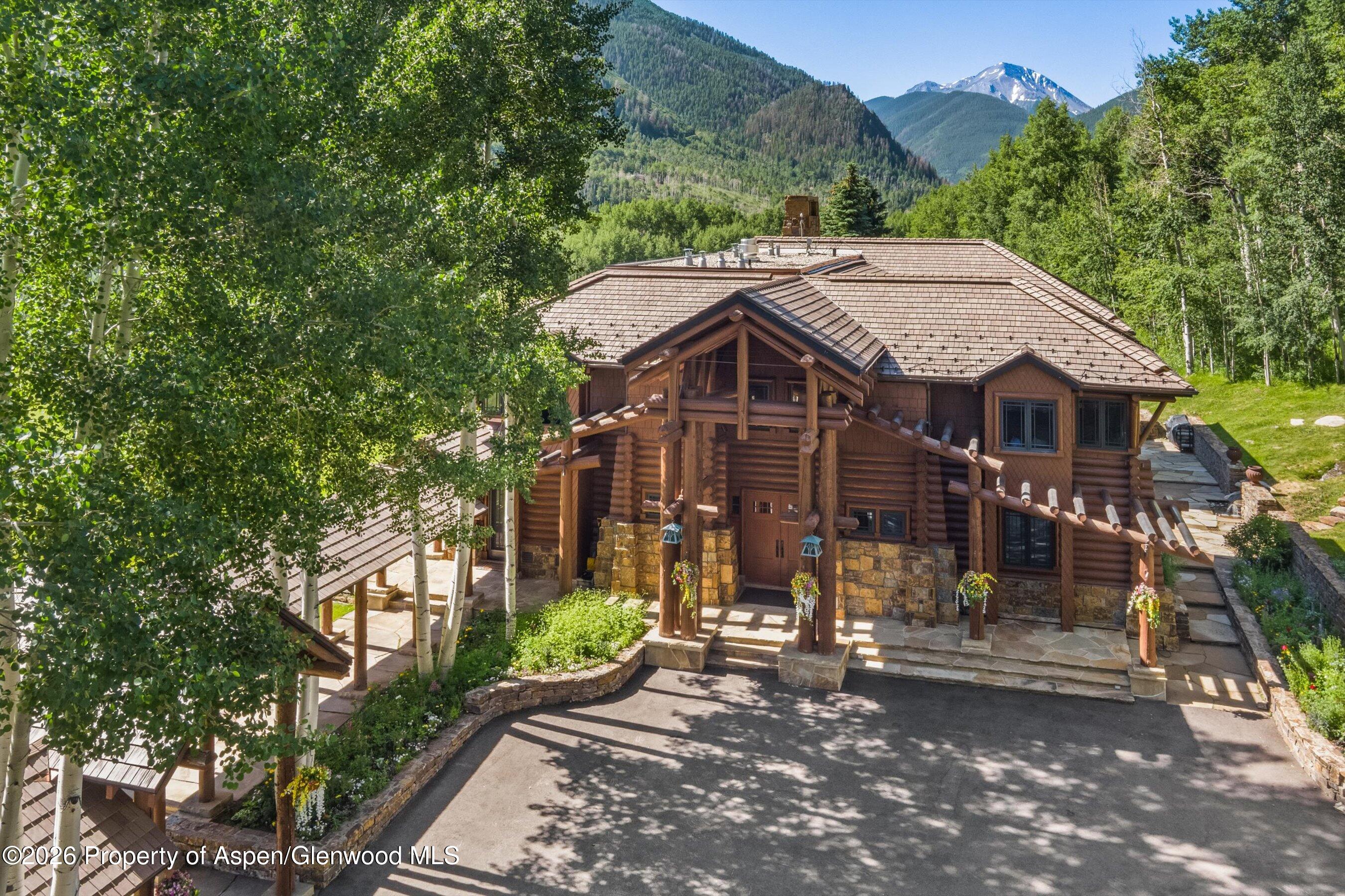 195 North Hayden Road Aspen, CO 81611 - Photo 2 of 39 a view of a house with a yard