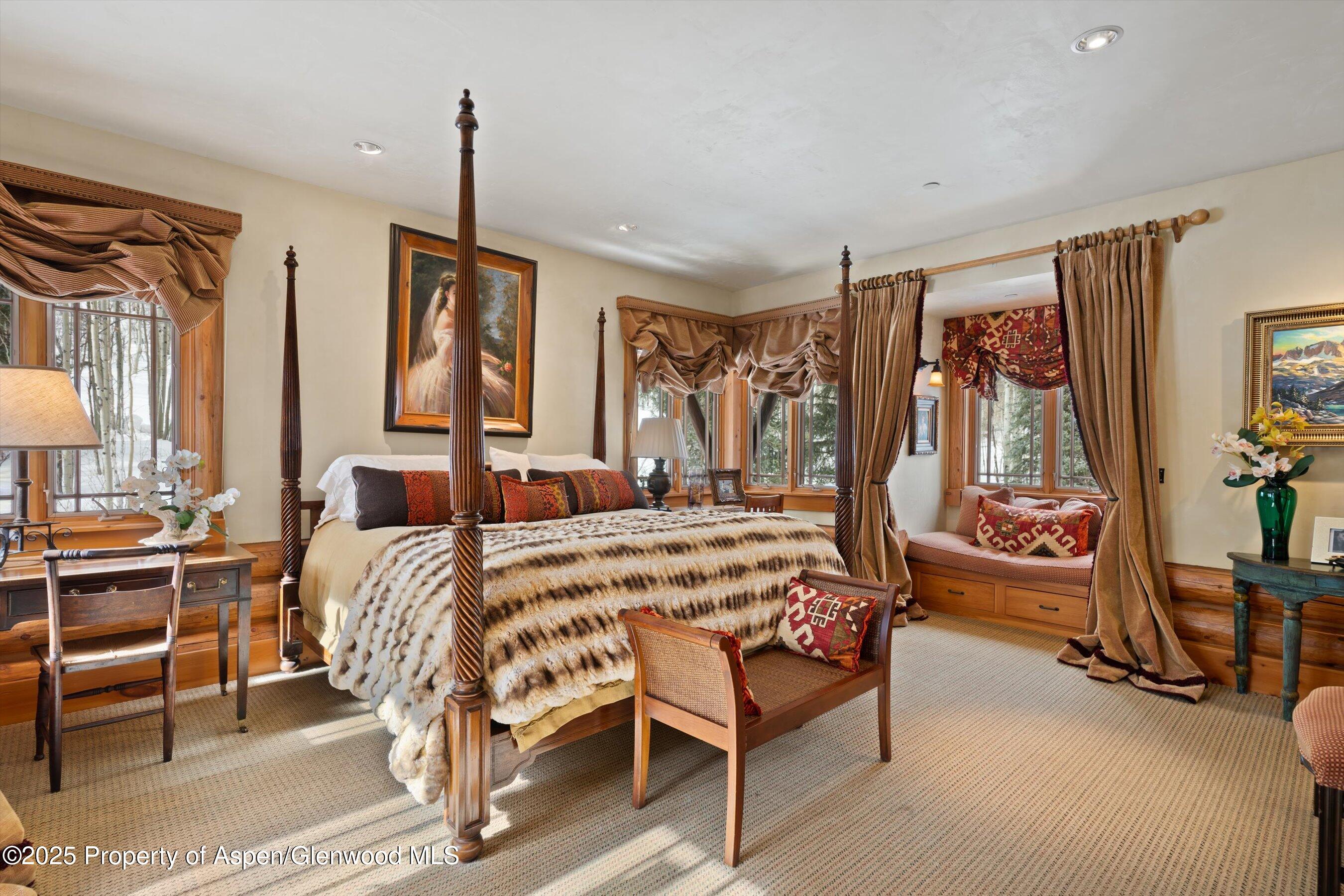 195 North Hayden Road Aspen, CO 81611 - Photo 27 of 39 a bedroom with furniture and a large window
