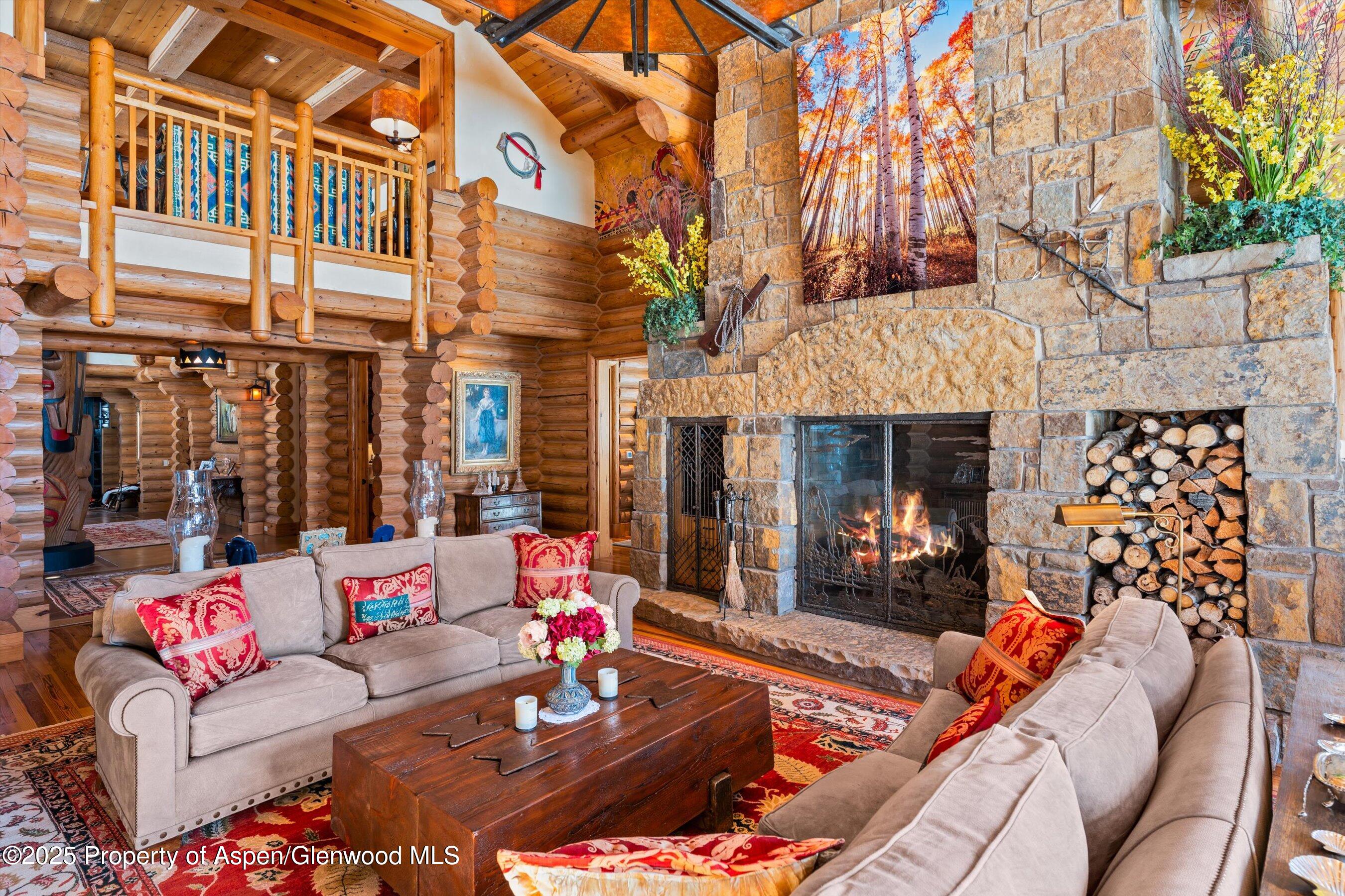 195 North Hayden Road Aspen, CO 81611 - Photo 7 of 39 a outdoor living space with patio furniture and a fireplace