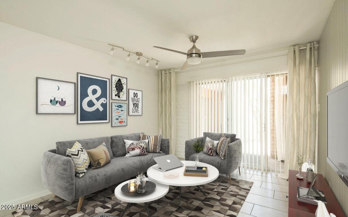 4351 North 36th Place, Unit 3 Phoenix, AZ 85018 - Photo 7 of 11 a living room with furniture and a large window