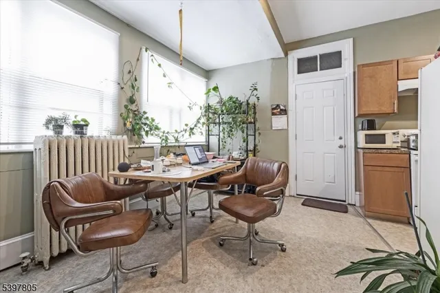 a view of a livingroom with furniture