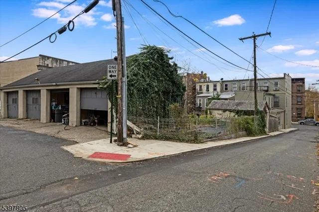 a view of a patio with a table and chairs