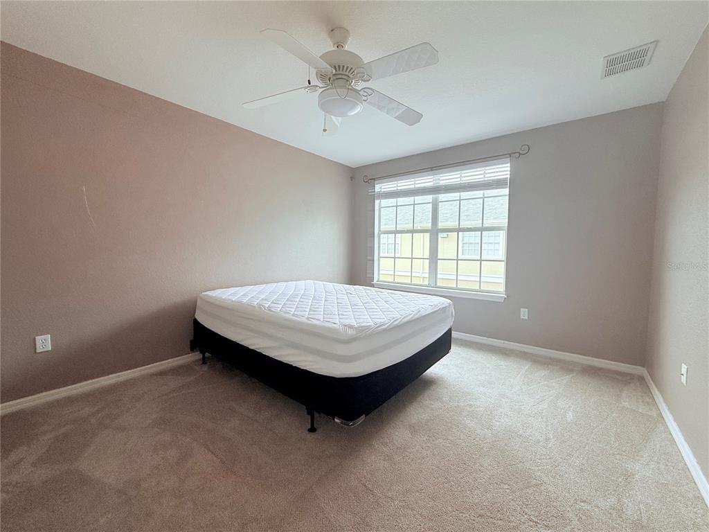 100 Turpial Way, Unit 107 Melbourne, FL 32901 - Photo 10 of 16 an outdoor space with a window