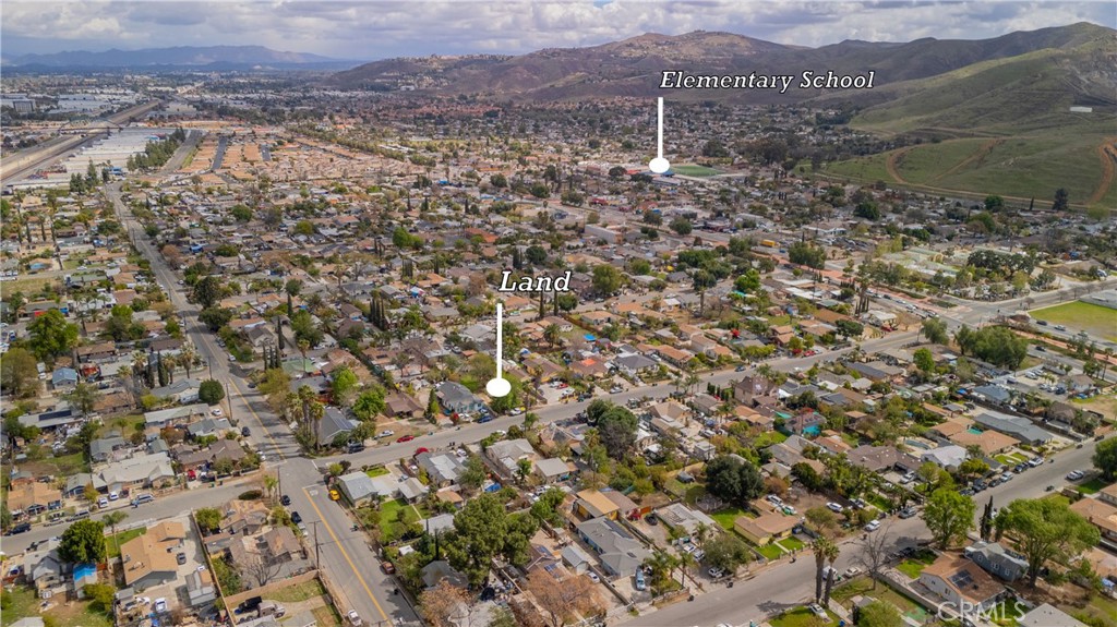 3957 South Neece Street Corona, CA 92879 - Photo 16 of 23 a view of a house with a yard