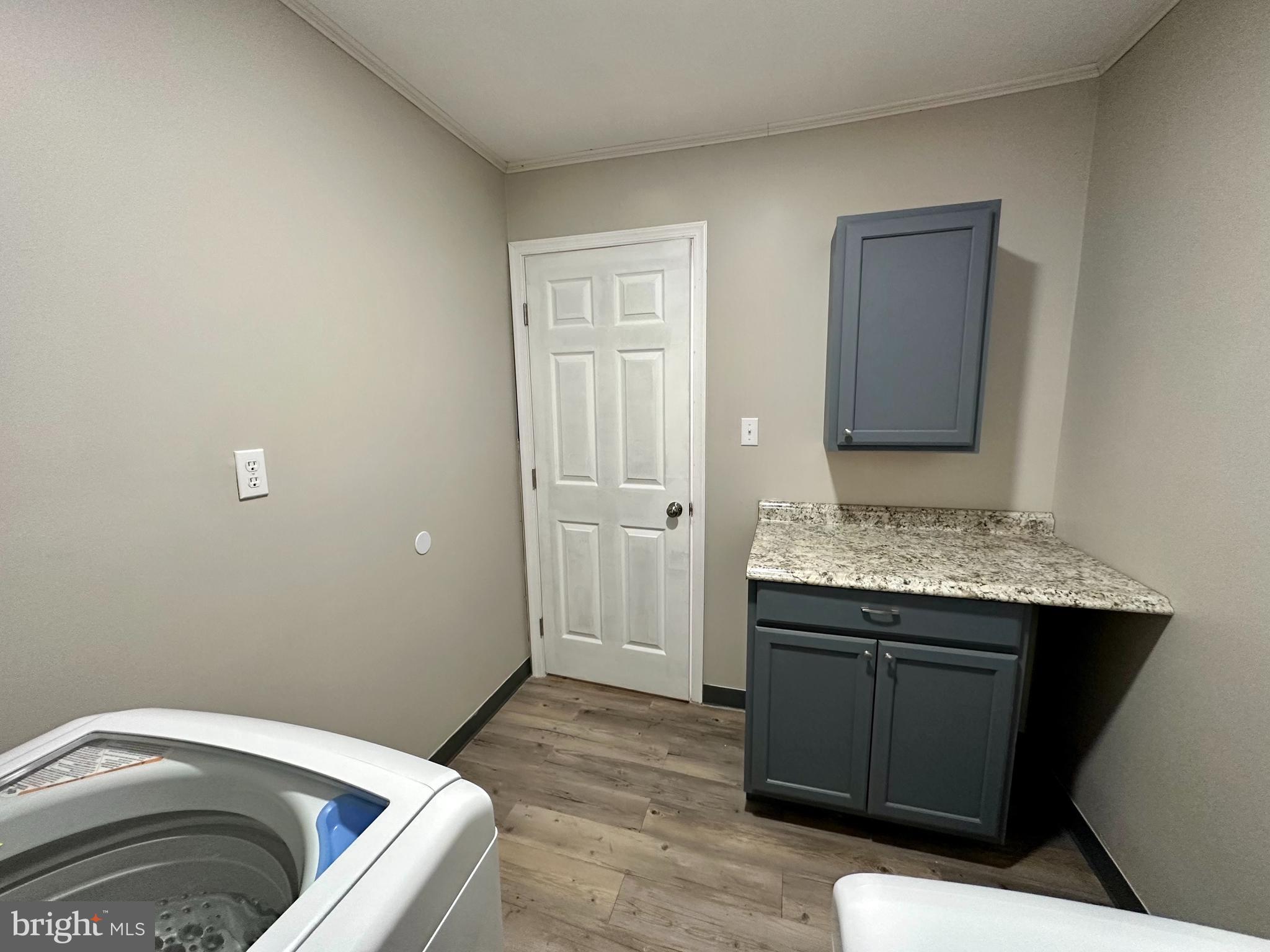 749 River Road Dover, DE 19901 - Photo 13 of 19 a bathroom with a granite countertop sink and toilet