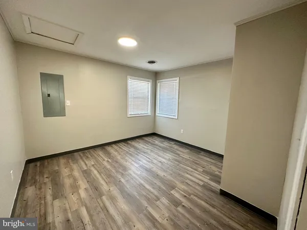 a view of an empty room and window