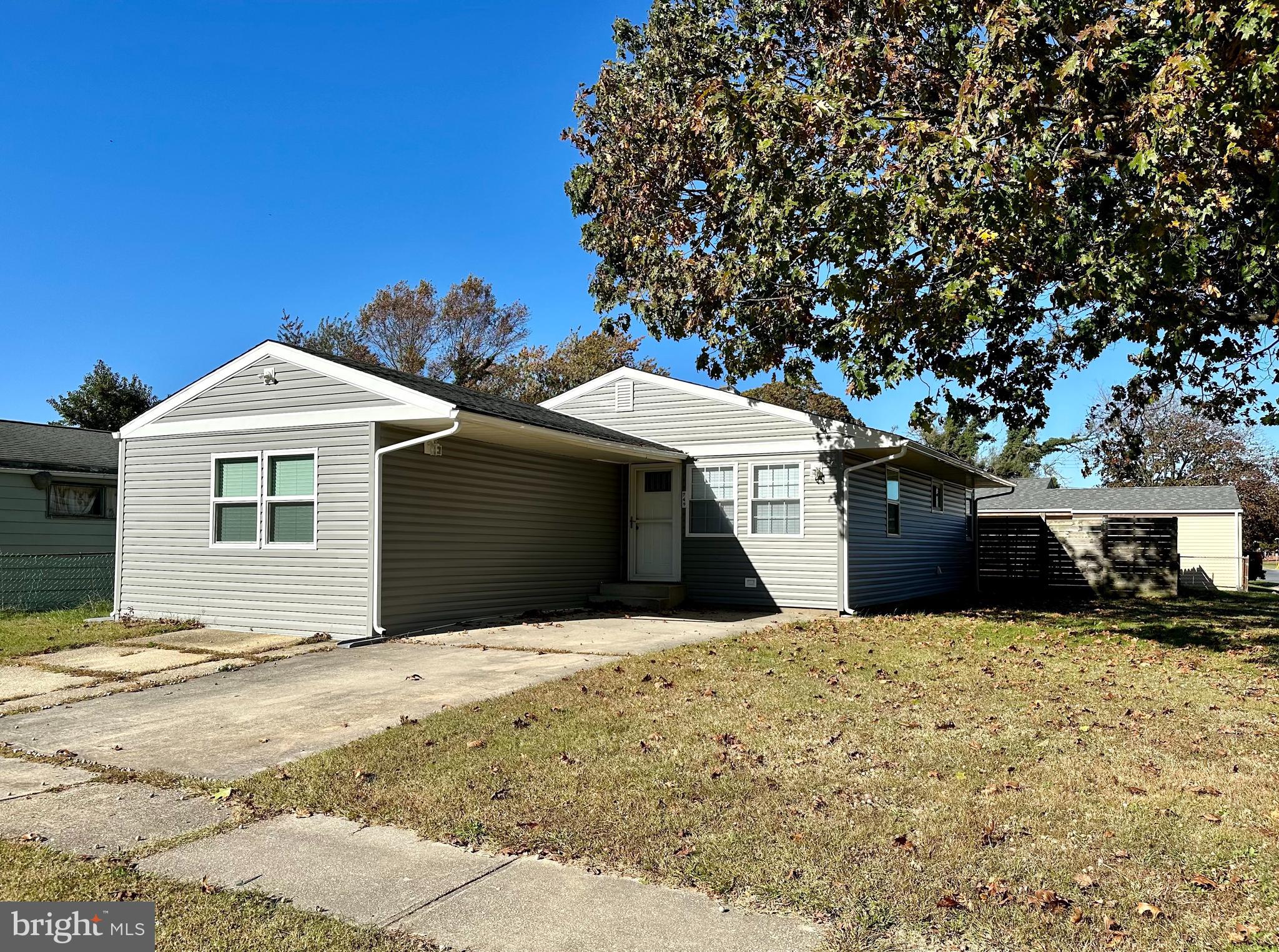 749 River Road Dover, DE 19901 - Photo 19 of 19 a front view of a house with a yard