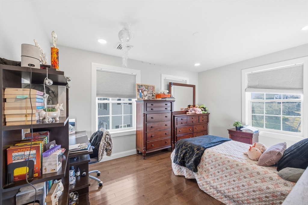 12 Sutton Street Peabody, MA 01960 - Photo 20 of 32 a bedroom with furniture and a window