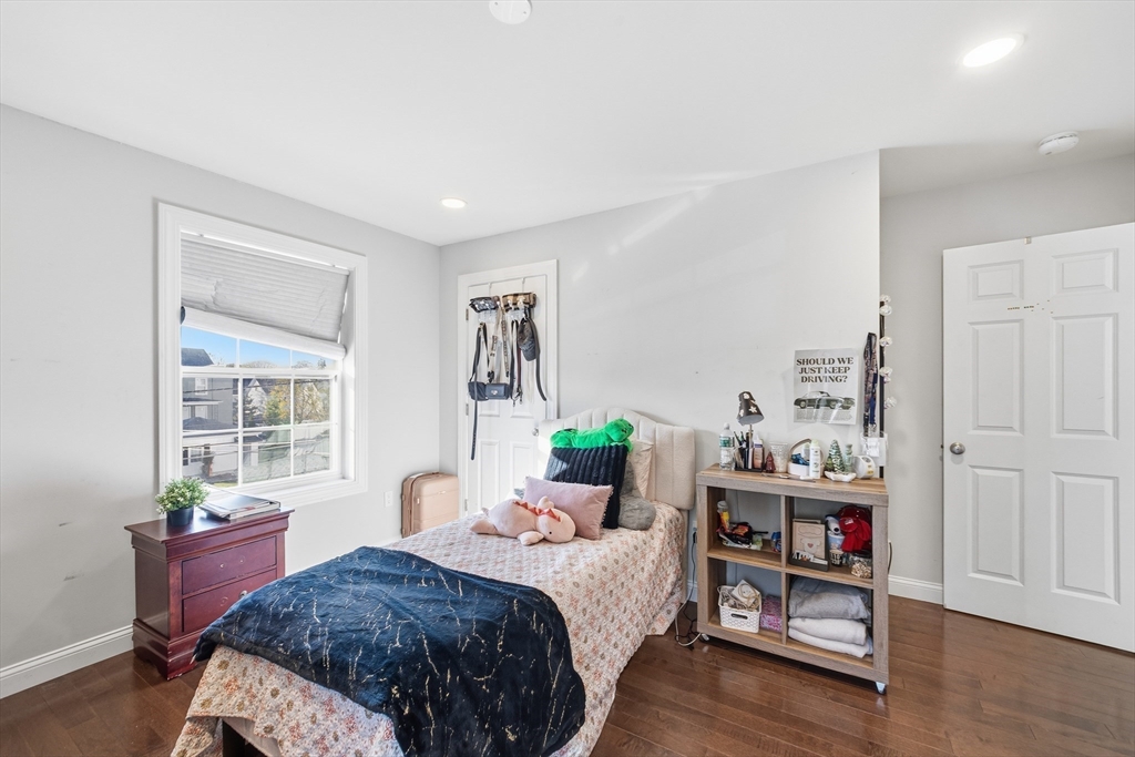 12 Sutton Street Peabody, MA 01960 - Photo 21 of 32 a bedroom with bed and a window