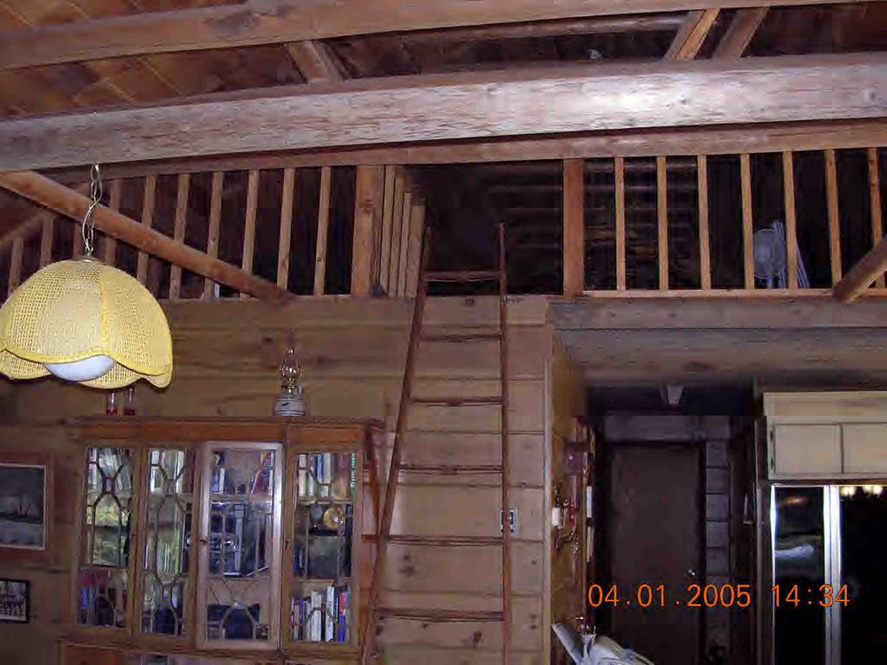 8 Hayre Island Road Otis, MA 01029 - Photo 3 of 6 a view of staircase with railing and a potted plant