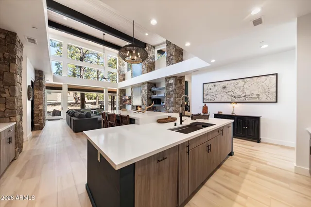 a kitchen with a stove and a refrigerator