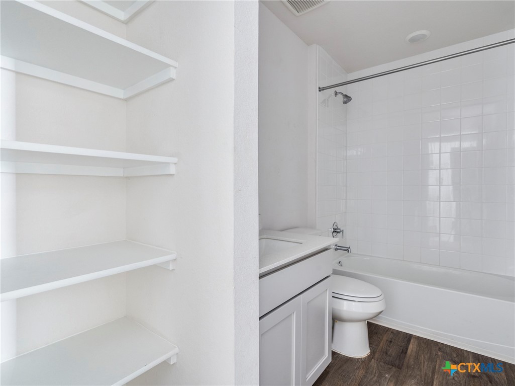 316 Addison Place Lockhart, TX 78644 - Photo 21 of 28 a bathroom with a toilet and a shower