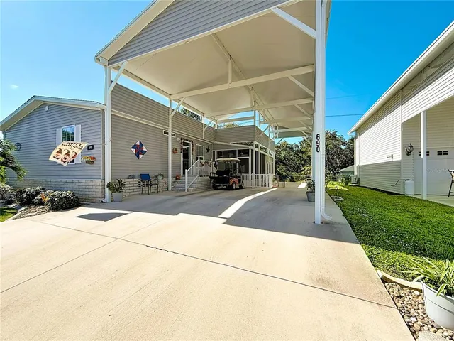 a view of a building with a yard