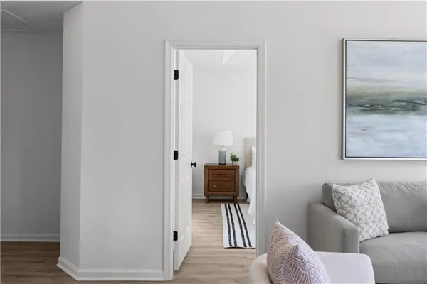 a living room with furniture and a gate