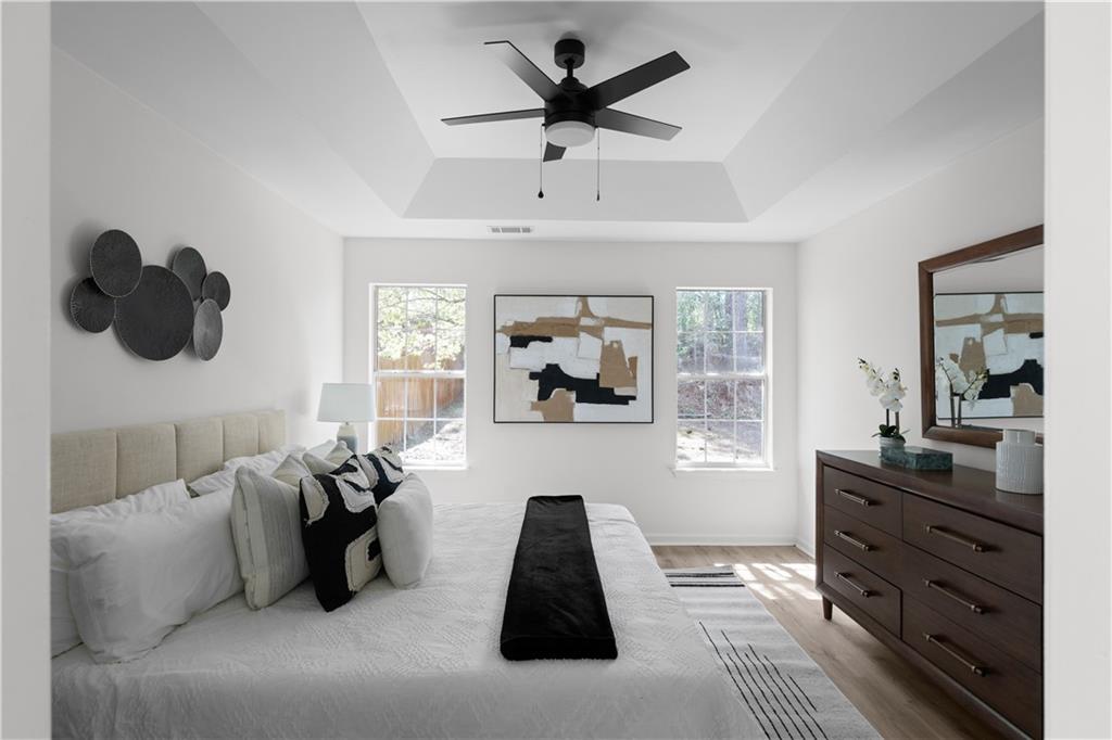 2203 Hidden Creek Drive Decatur, GA 30035 - Photo 16 of 24 a living room with furniture and a chandelier