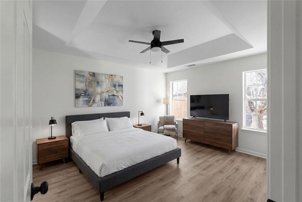 2203 Hidden Creek Drive Decatur, GA 30035 - Photo 21 of 24 a bedroom with a bed and a television