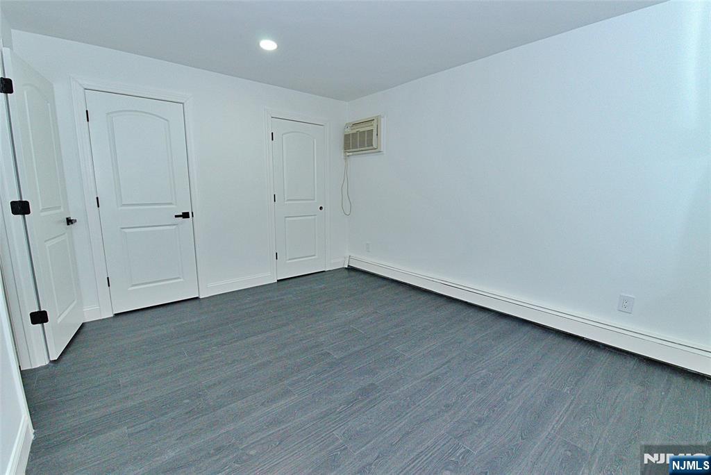 401 Undercliff Avenue Edgewater, NJ 07020 - Photo 14 of 50 a view of a room with wooden floor