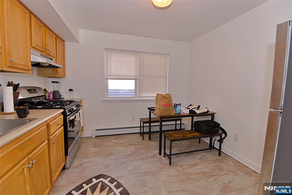 401 Undercliff Avenue Edgewater, NJ 07020 - Photo 26 of 50 a view of a workspace with furniture and a window