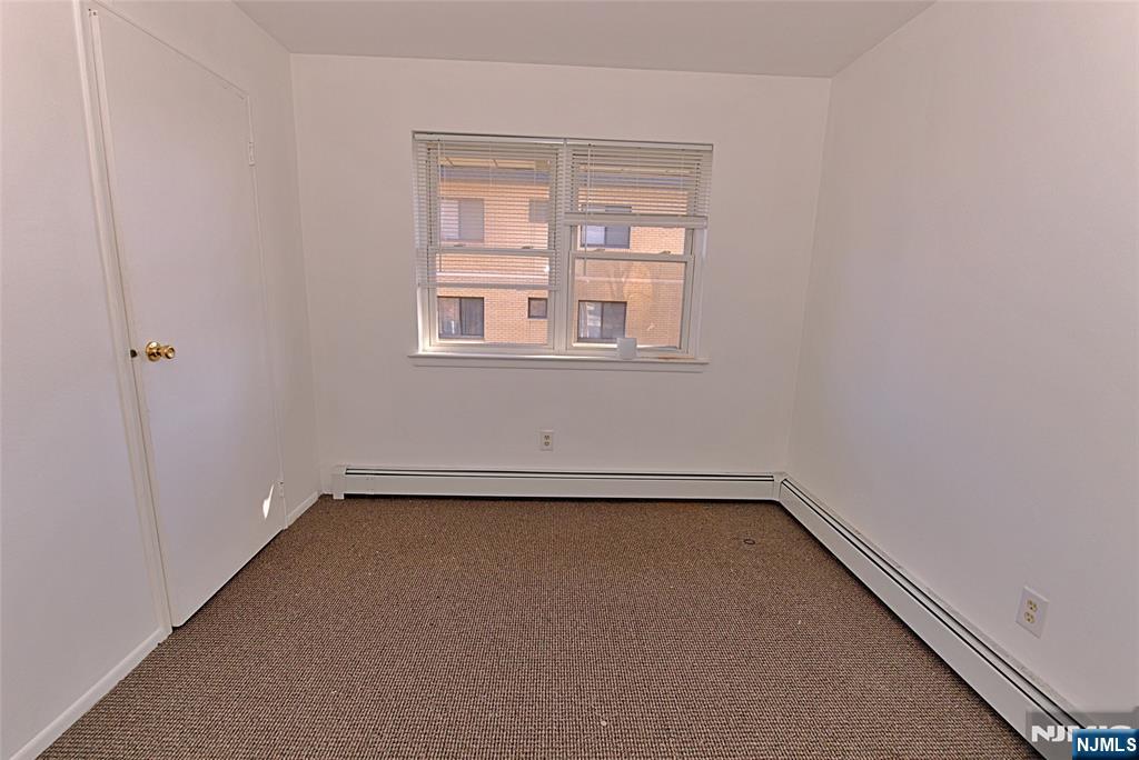 401 Undercliff Avenue Edgewater, NJ 07020 - Photo 29 of 50 an empty room with a window