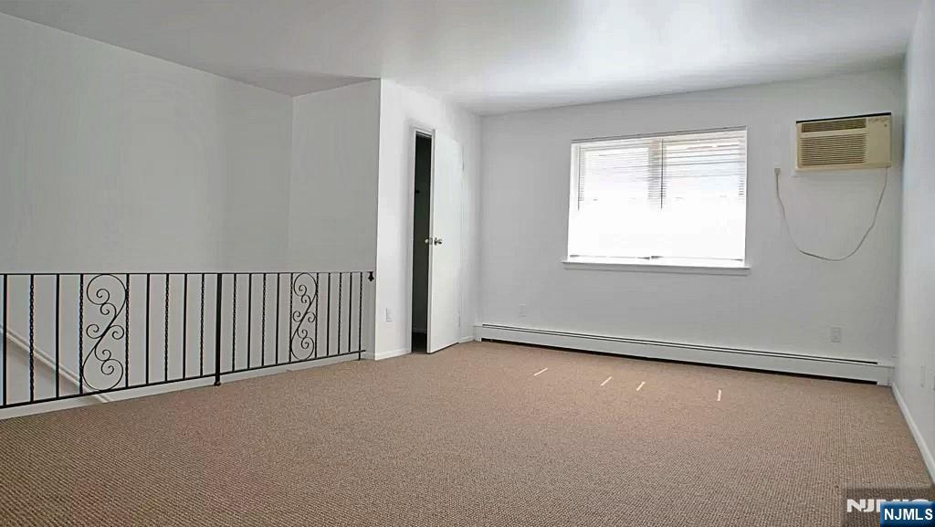 401 Undercliff Avenue Edgewater, NJ 07020 - Photo 41 of 50 an empty room with a window