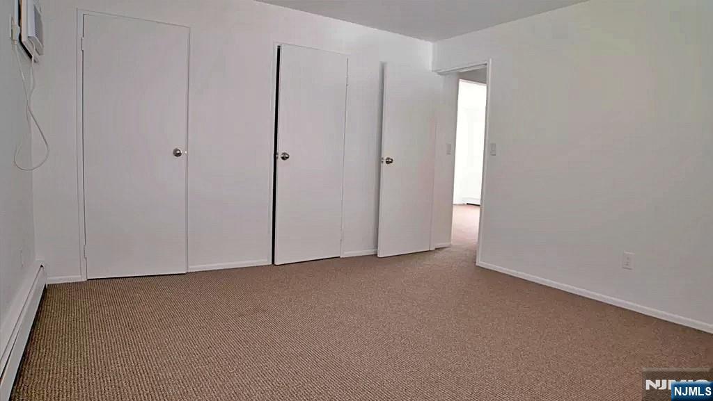 401 Undercliff Avenue Edgewater, NJ 07020 - Photo 45 of 50 a view of room with hallway