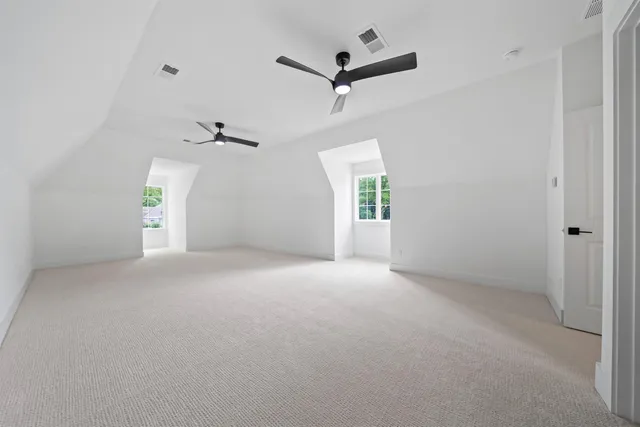 a view of empty room with windows