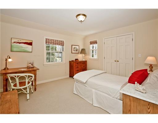 122 Colony Road Darien, CT 06820 - Photo 14 of 19 a bedroom with a bed and a cabinets
