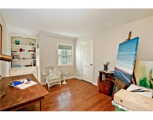 122 Colony Road Darien, CT 06820 - Photo 15 of 19 a living room with furniture and a flat screen tv